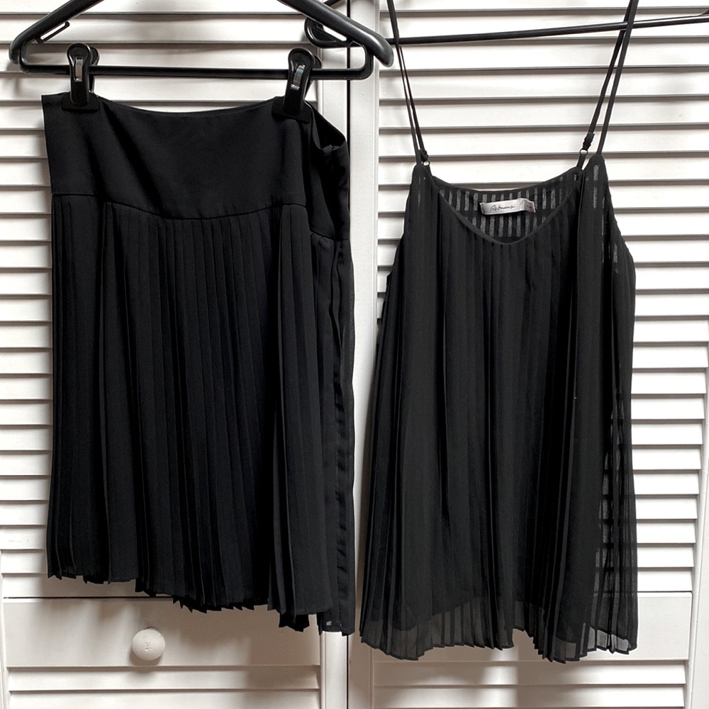 2 pieces black top and matching skirt size XS